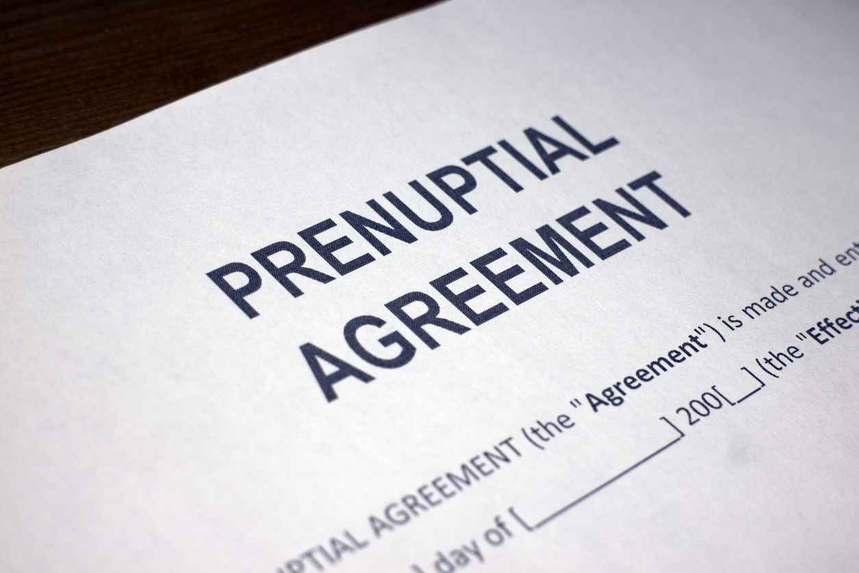 A closeup document with the title "Prenuptial Agreement."